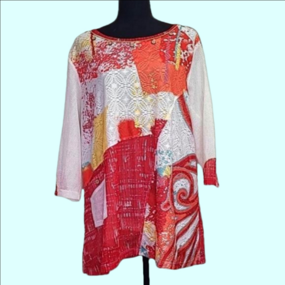 Multiples long sleeved pattern top. White lining. Size PXL.